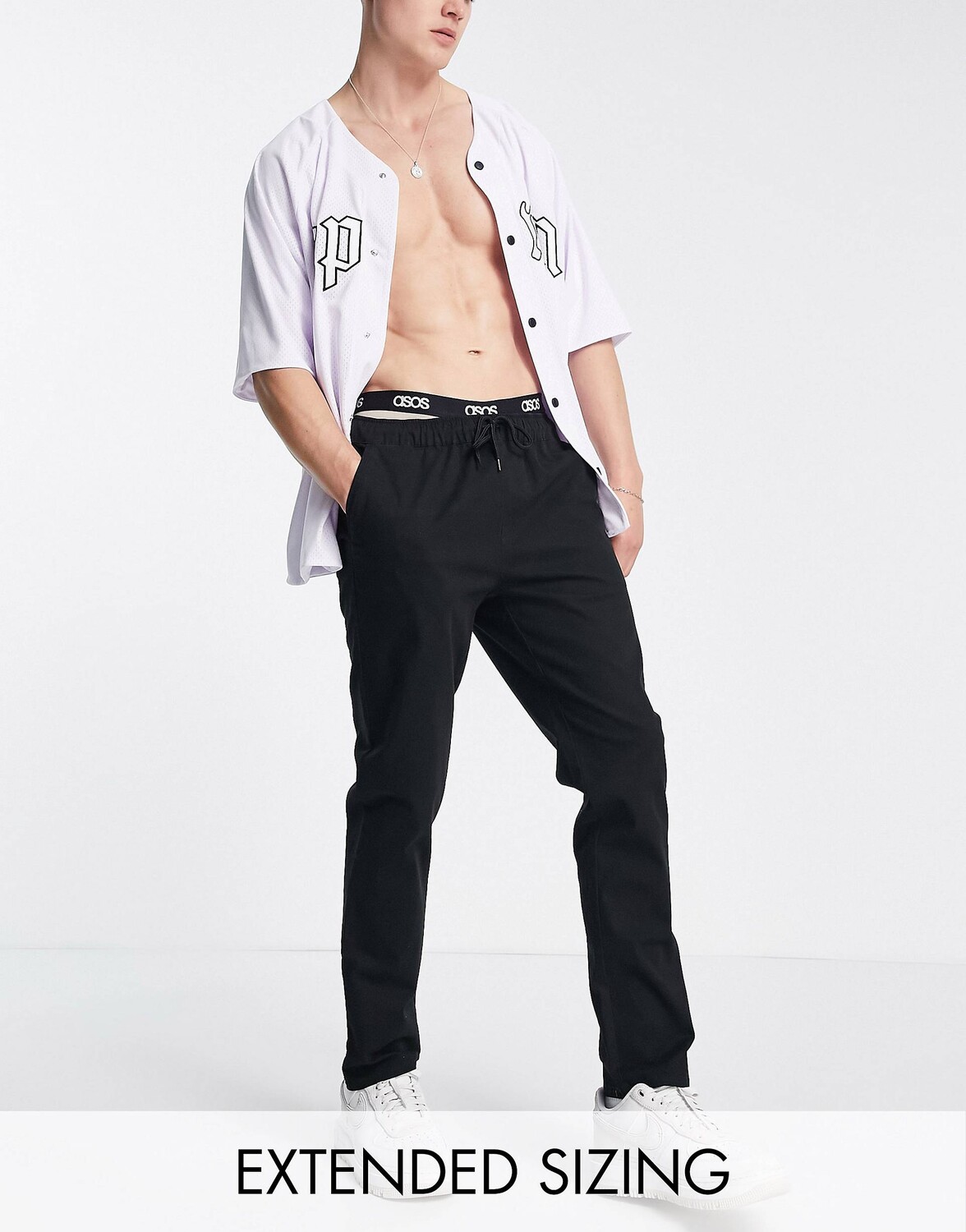 

Черные узкие брюки чинос с эластичным поясом ASOS DESIGN, Черный