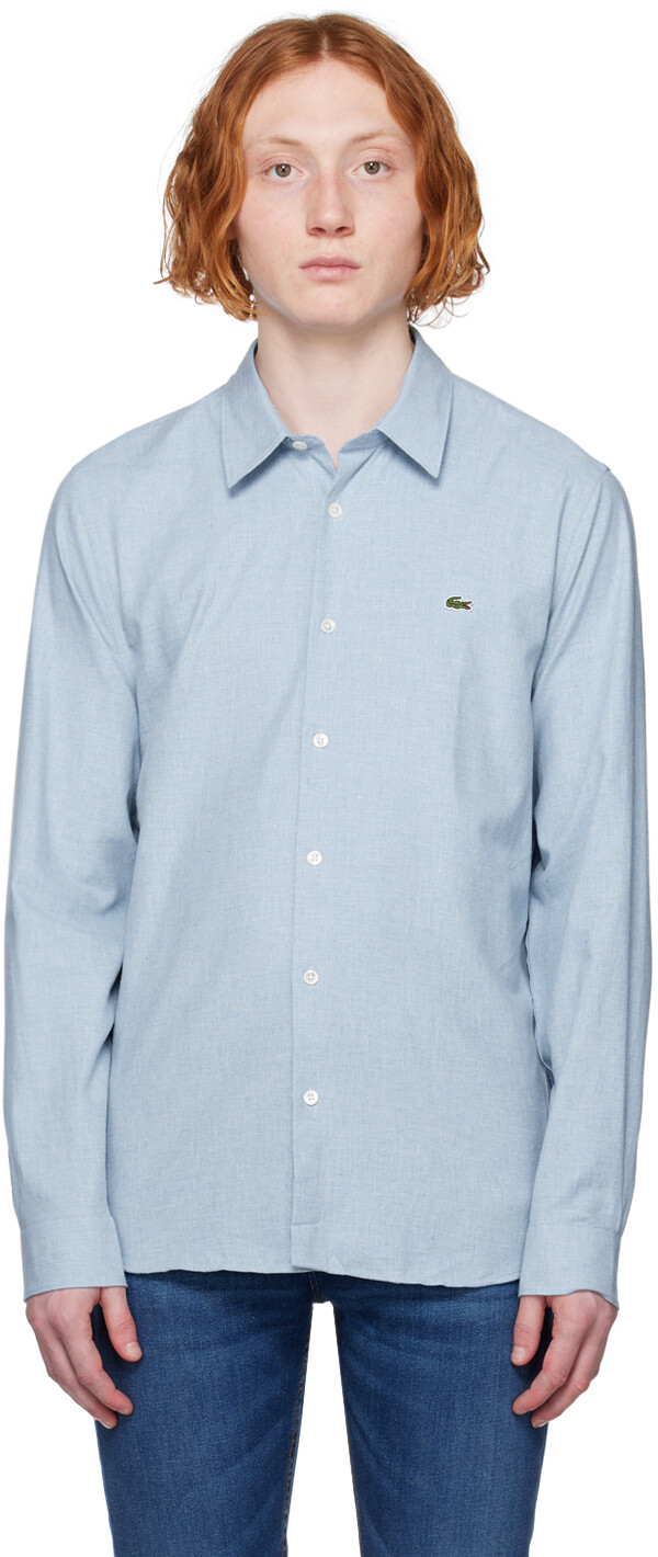 

Синяя рубашка с нашивками Lacoste