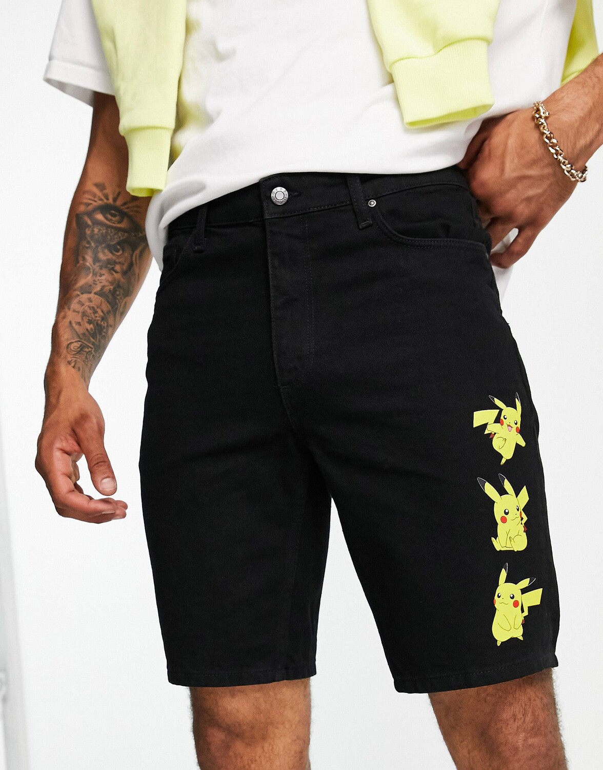 

Черные шорты с принтом Pokemon ASOS DESIGN