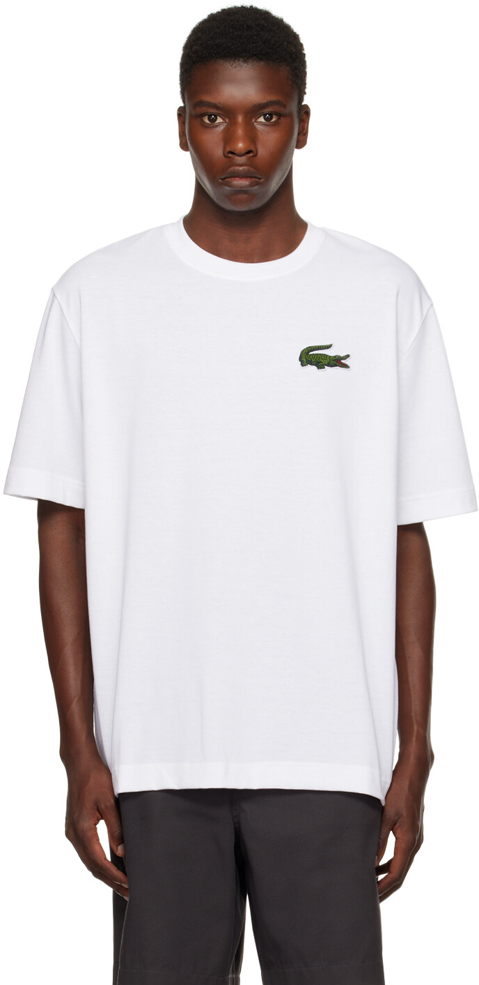 

Белая футболка с вышивкой Lacoste