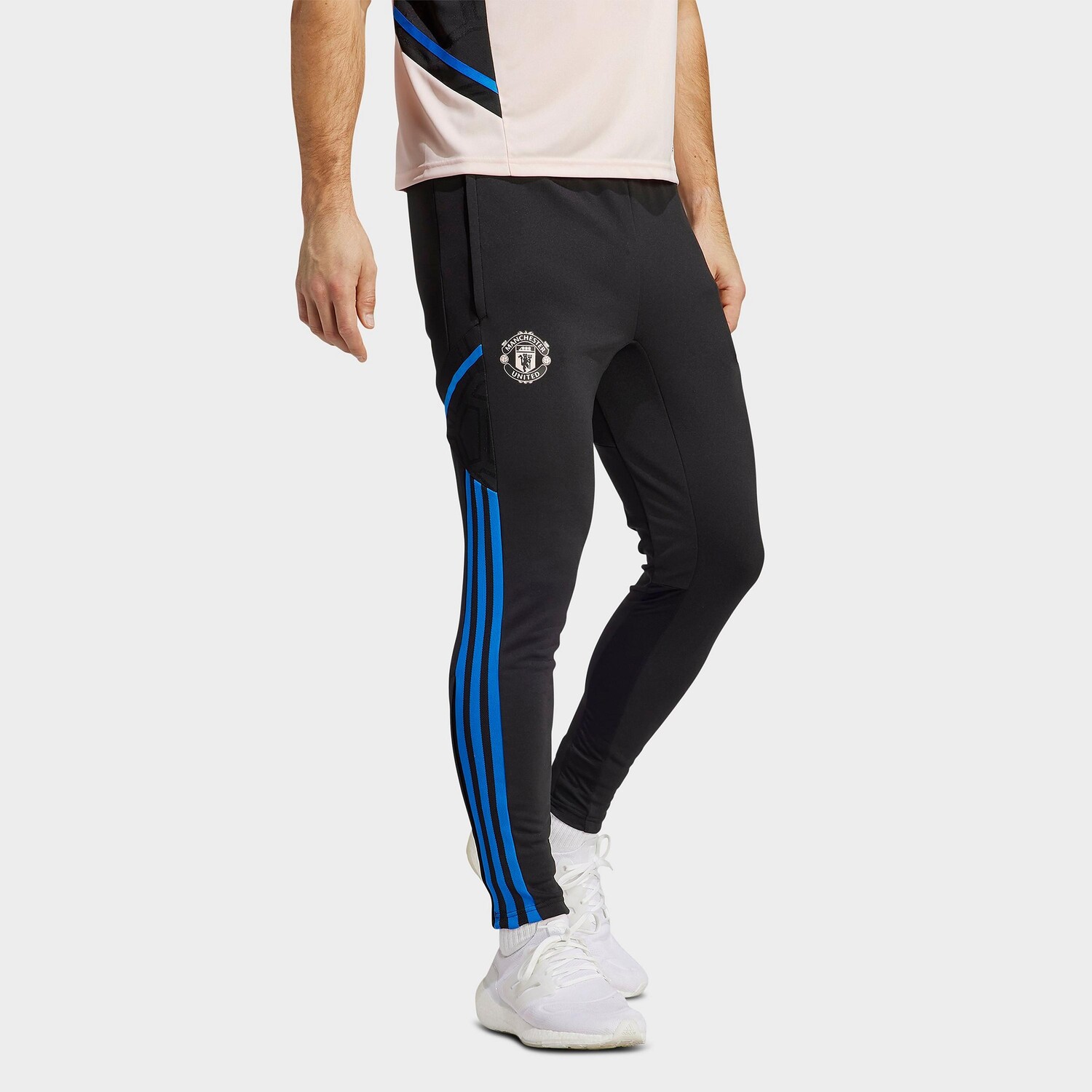 

Мужские тренировочные брюки Adidas Soccer Manchester United Condivo 22, черный