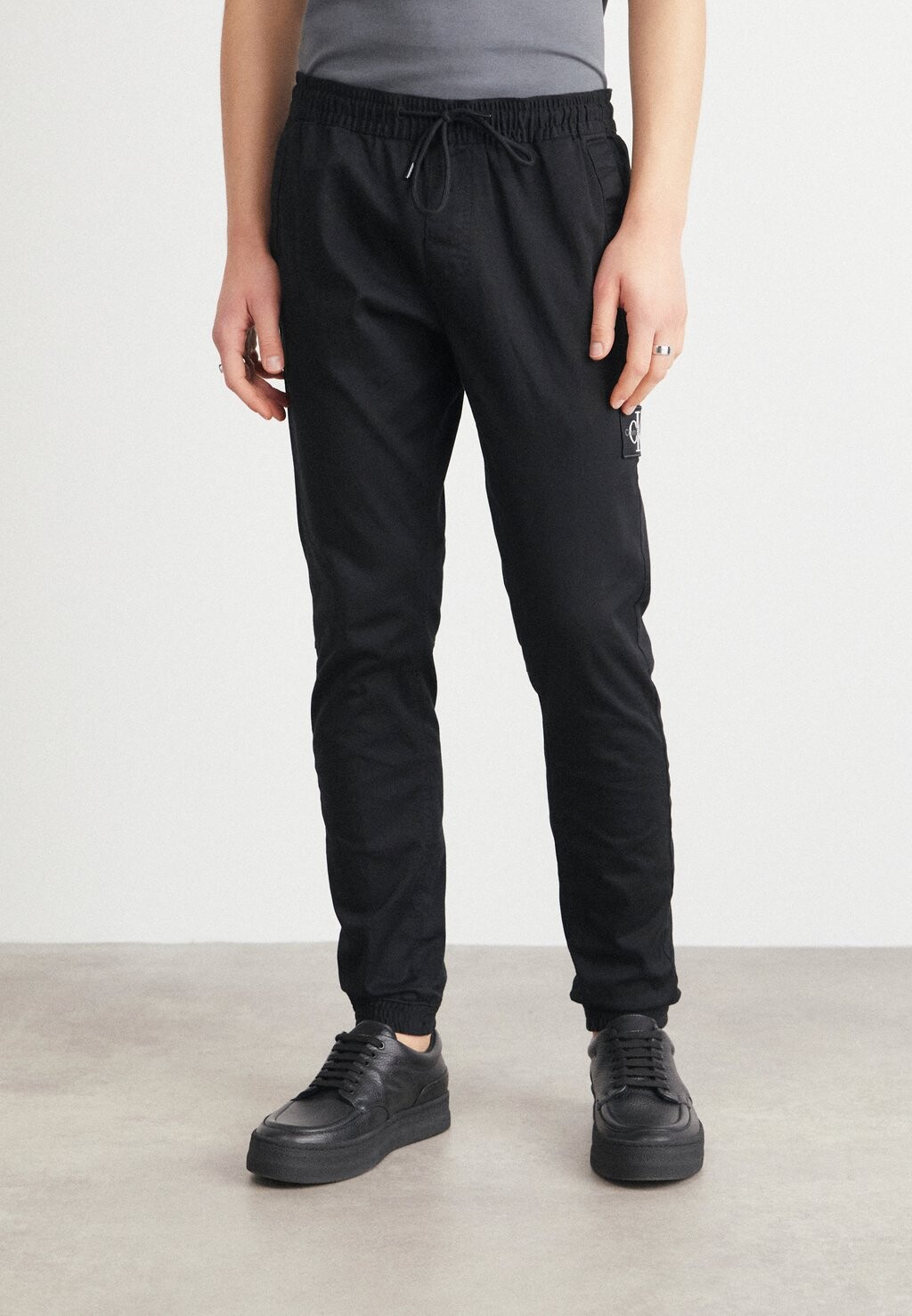 

Тренировочные брюки Calvin Klein Jeans, черный