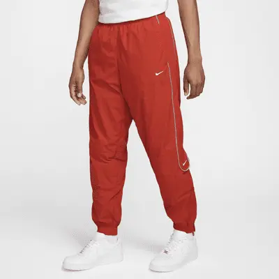 

Брюки Nike Solo Swoosh, цвет Dragon Red/White