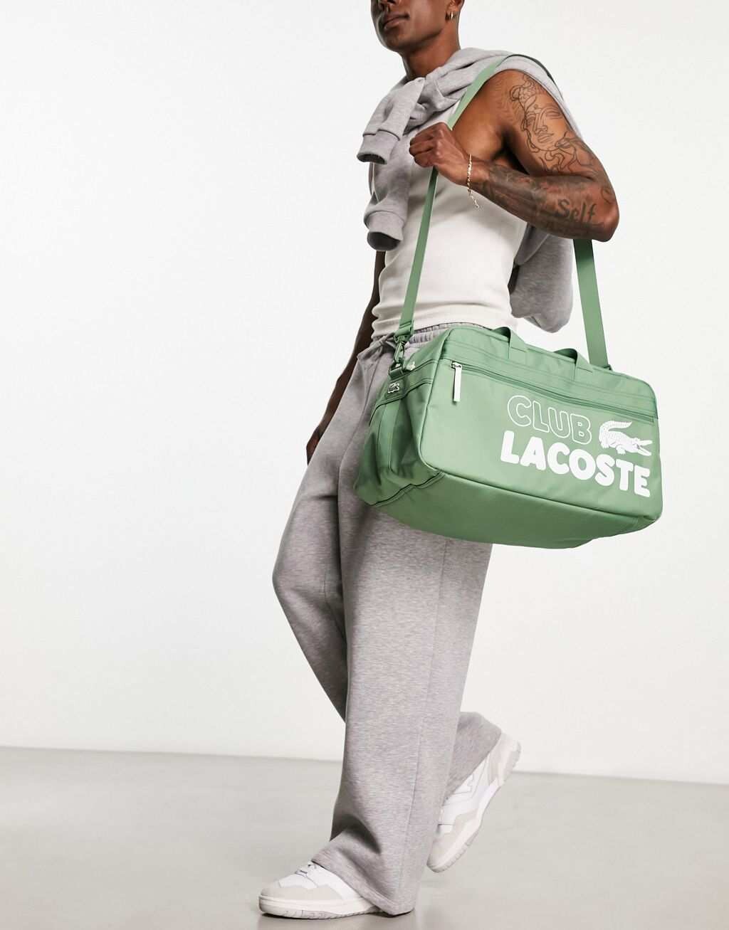 

Зеленая дорожная сумка с логотипом Lacoste Club