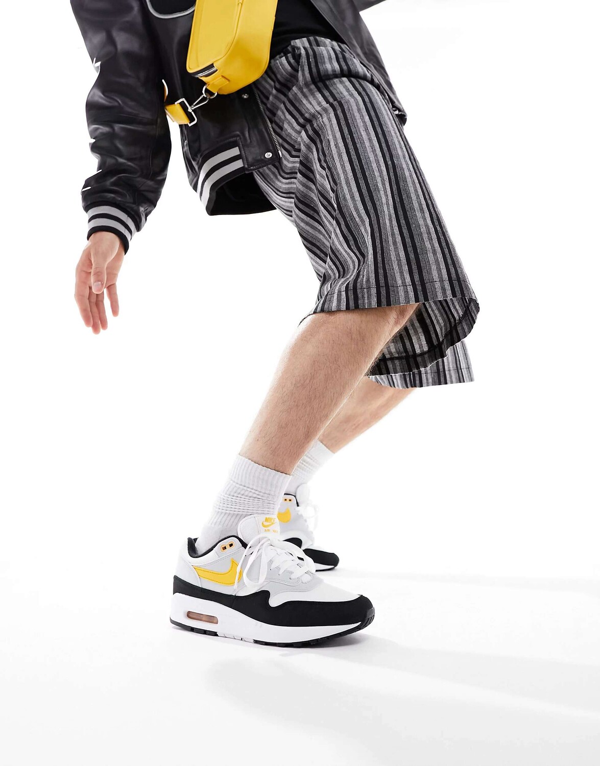 

Кроссовки Nike Air Max 1 белого, черного и оранжевого цвета, Черный