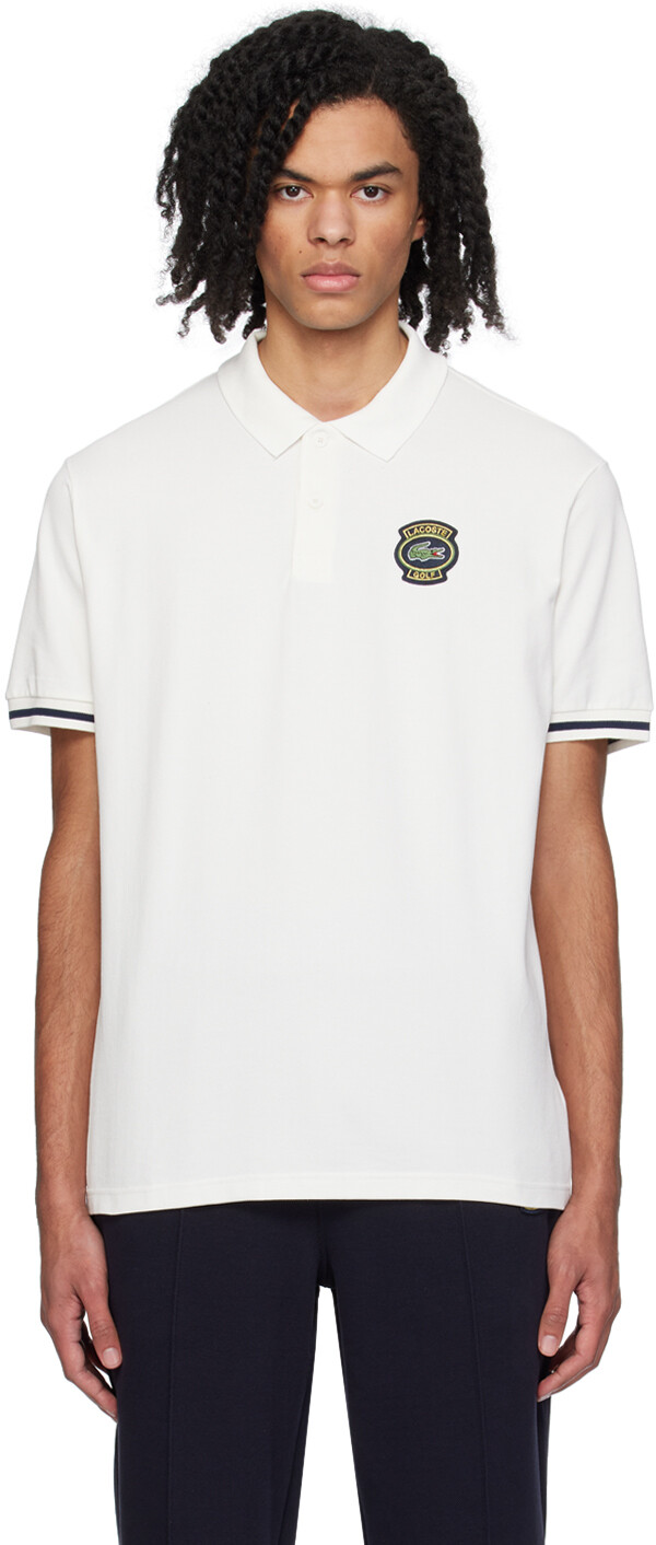 

Белая футболка-поло с нашивками Lacoste