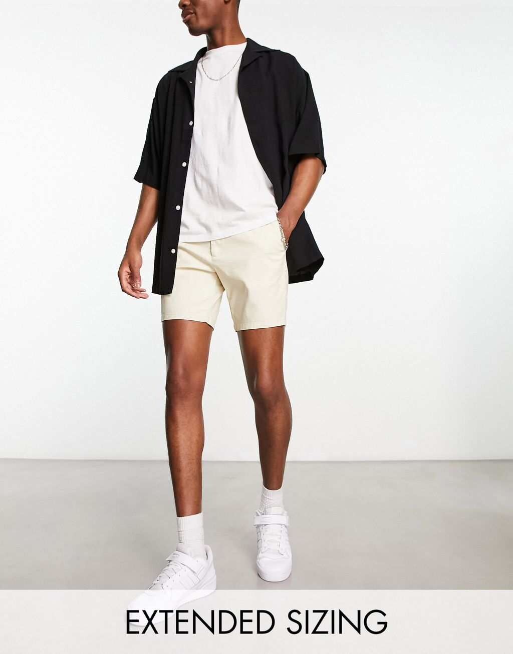 

Бежевые шорты-чиносы средней длины ASOS DESIGN