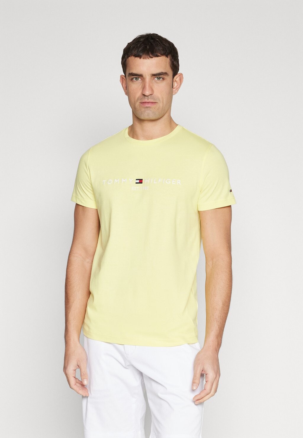 

Футболка с принтом Logo Tee Tommy Hilfiger, цвет yellow tulip