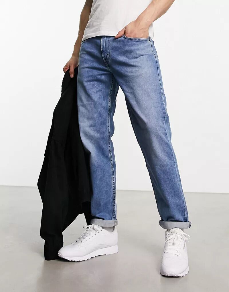 

Голубые зауженные джинсы Levi's 502