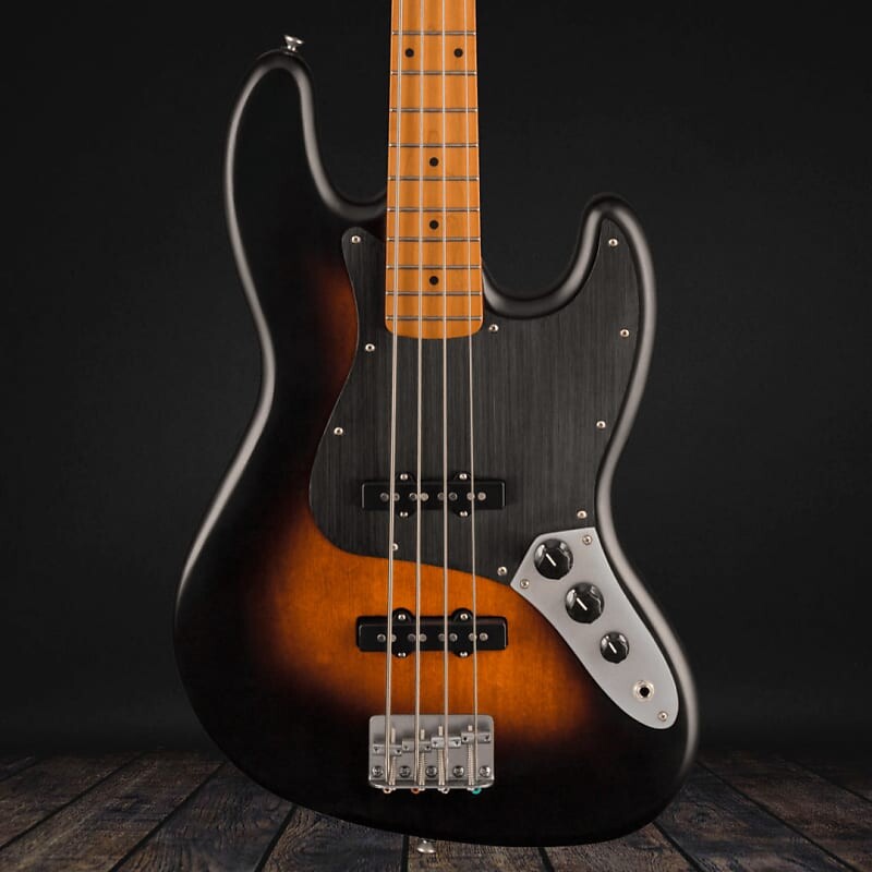 

Squier 40th Anniversary Jazz Bass, Vintage Edition, золотая анодированная накладка - атласная широкая двухцветная солнечная вспышка Squier 40th Anniversary Jazz Bass, Edition, Gold Anodized Pickguard