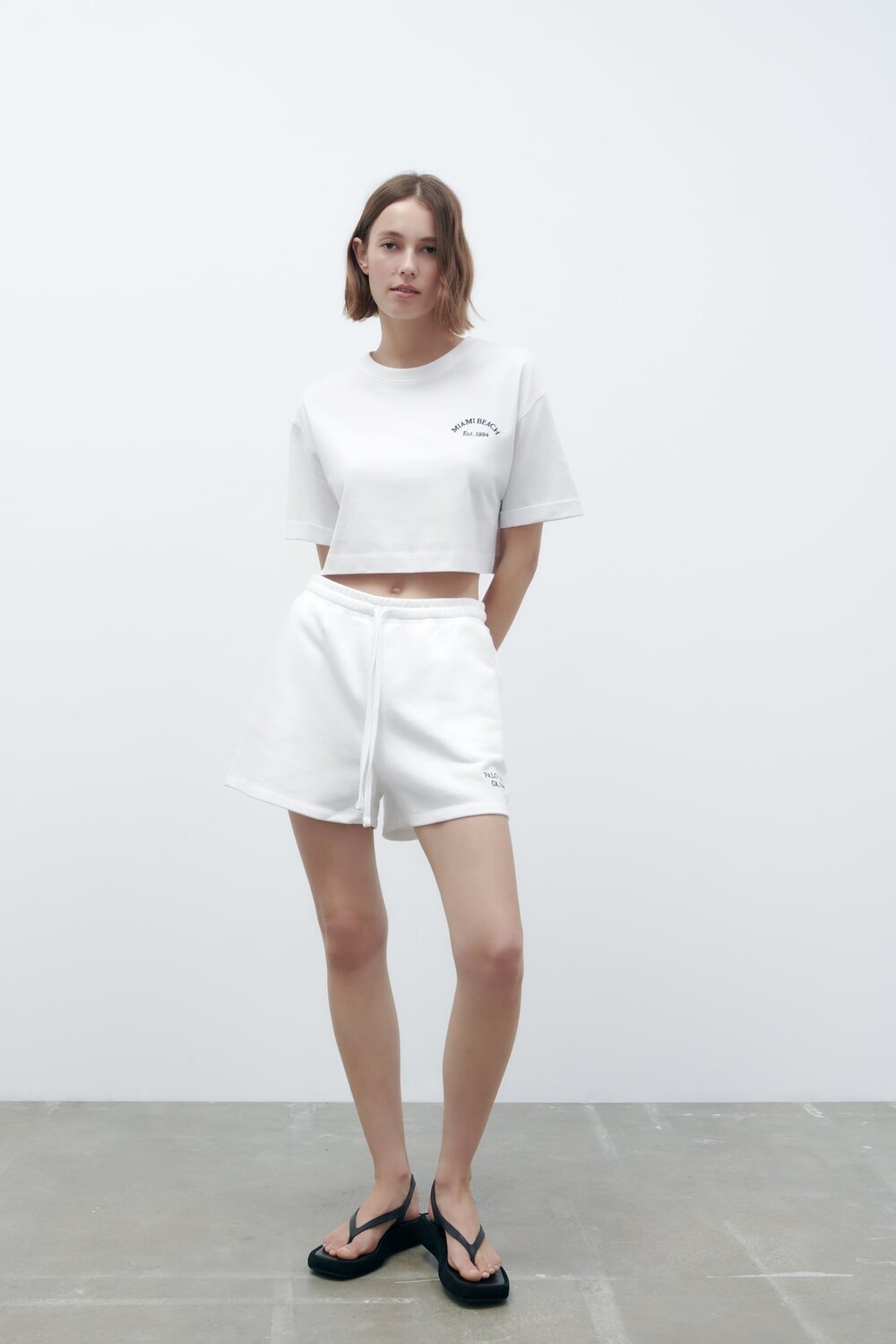 

Укороченная футболка с слоганом ZARA, белый