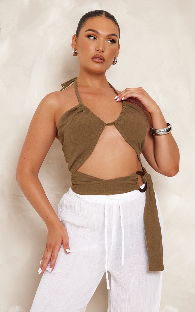 

PrettyLittleThing Укороченный топ с бретелькой хаки и льняной отделкой в ​​виде кольца