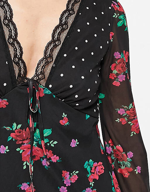 

Черное платье мини с цветочным и точечным принтом River Island, Черный