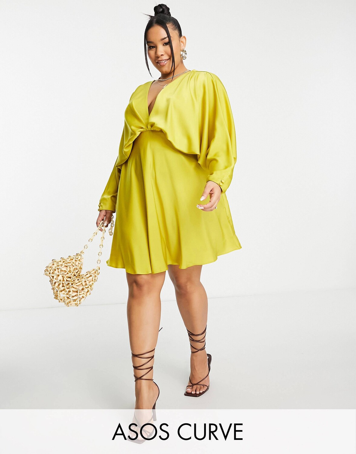 

Золотое атласное мини-платье с косой юбкой и завязками на спине ASOS DESIGN Curve Curve