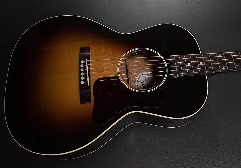 

L-00 Standard — винтажные солнечные лучи Gibson L-00 Standard -
