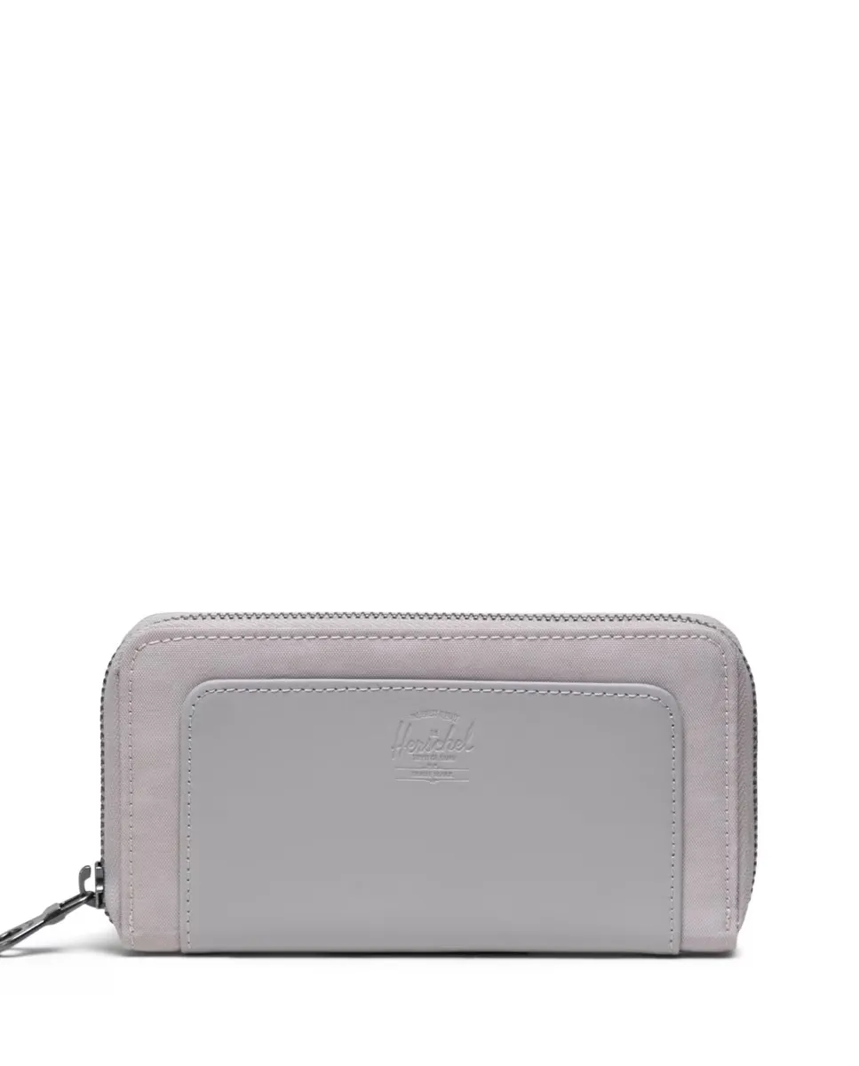 

Кошелек унисекс из бежевой ткани и кожи Herschel, розовый