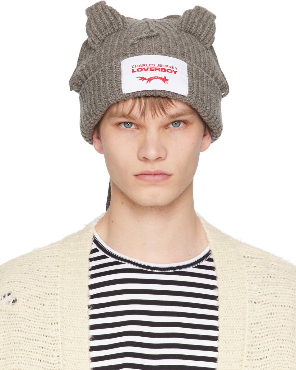

Серая шапка из массивного енота Charles Jeffrey Loverboy