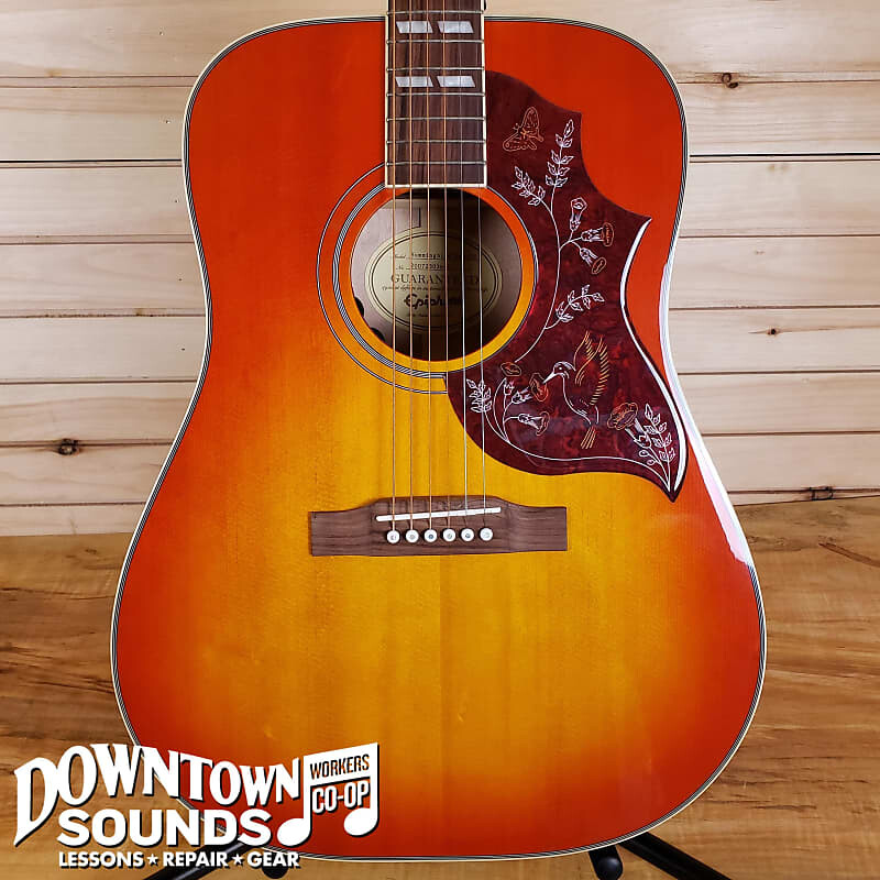 

Epiphone Hummingbird Pro AC/EL - Блеклая вишня HUMMINGBIRD STUDIO A/E - FADED CHERRY
