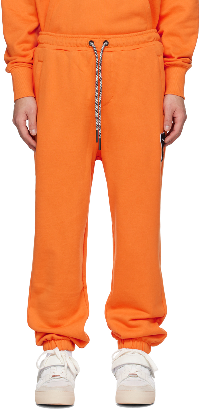 цена Оранжевые брюки Puma Edition Lounge AMI Alexandre Mattiussi