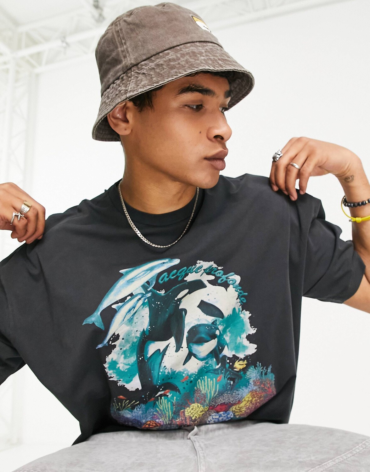

Черная оверсайз-футболка ASOS DESIGN с винтажным принтом на берегу океана ASOS DESIGN