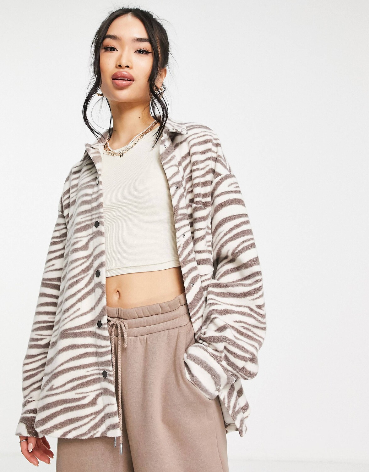 

Коричневая объемная куртка с принтом под зебру ASOS DESIGN