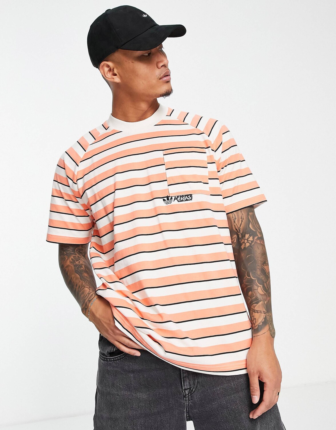 

Оранжево-белая полосатая футболка с карманами adidas Originals