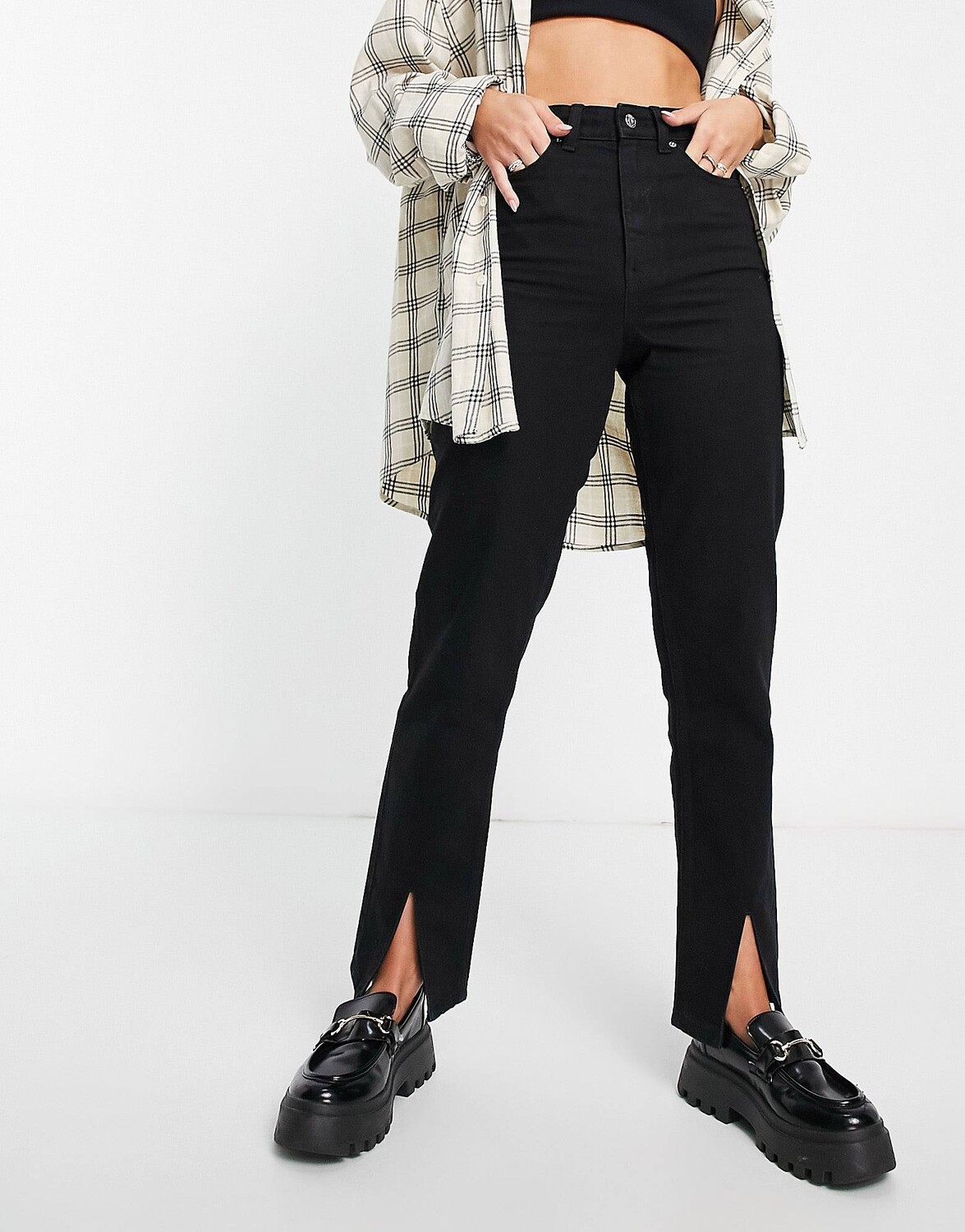 

Черные узкие джинсы с разрезом по низу ASOS DESIGN