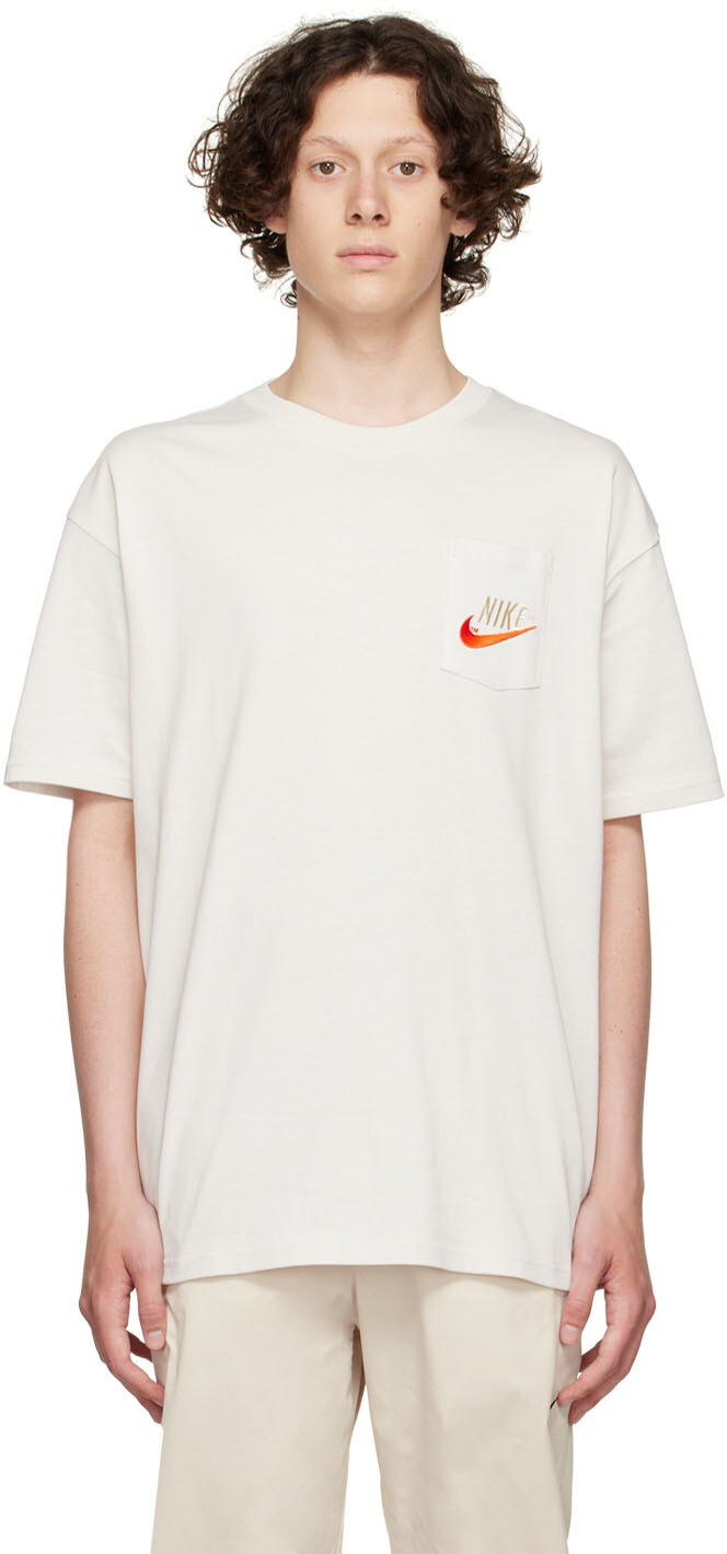 

Бежевая хлопковая футболка Nike