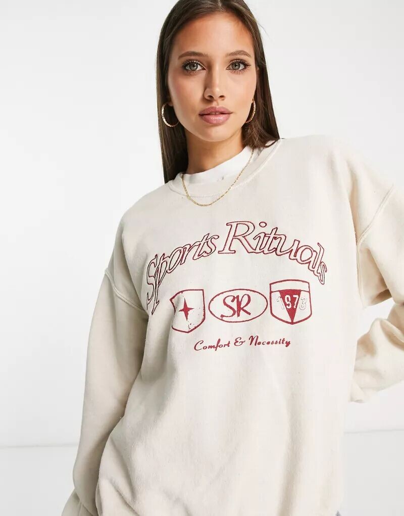 

Бежевый свитшот оверсайз Topshop с графическим принтом Sports Rituals