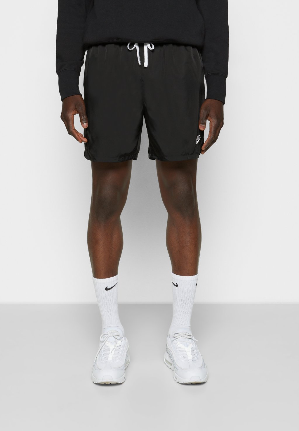 цена Спортивные брюки M NSW SPE WVN LND FLOW SHORT Nike, черный/белый