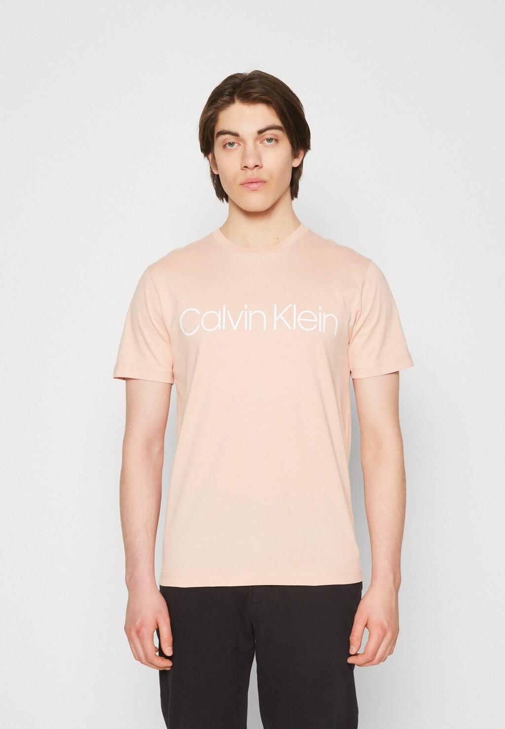

Футболка с принтом Calvin Klein, светло-оранжевый
