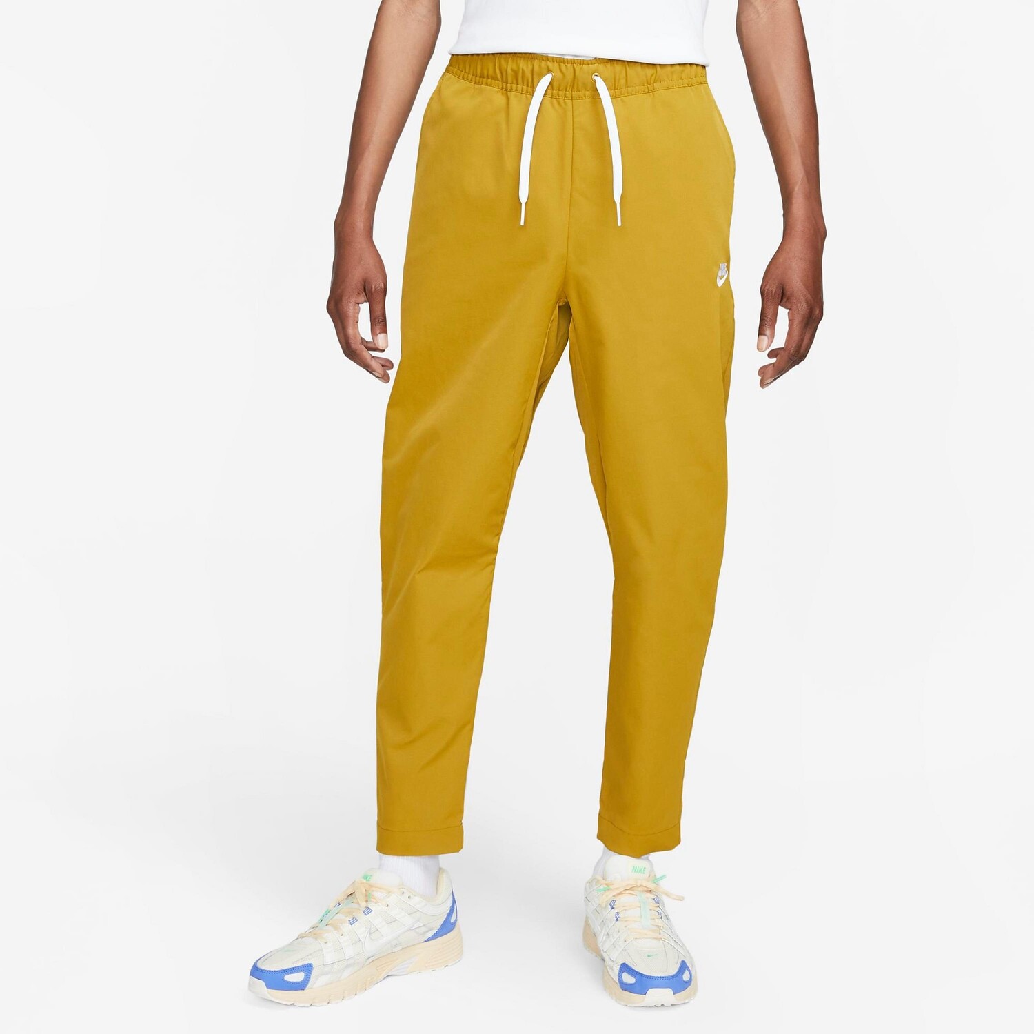 

Мужские тканые зауженные брюки Nike Club, желтый