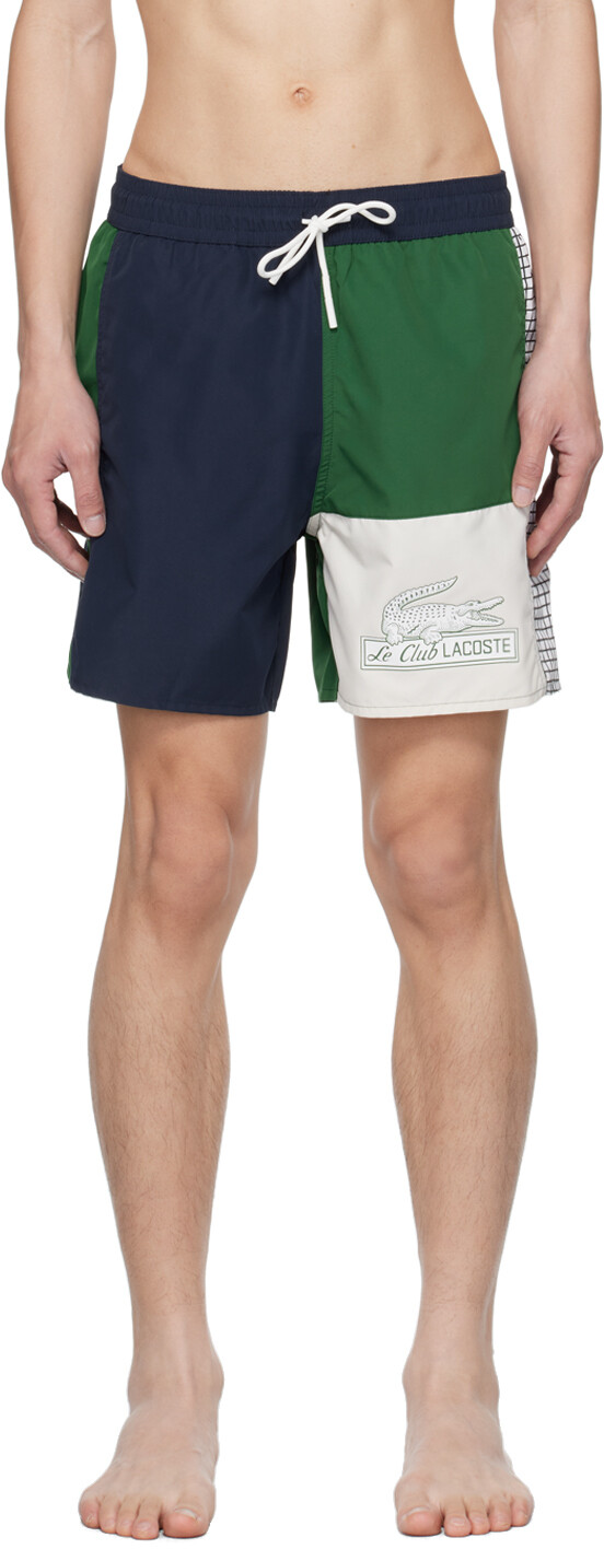 

Темно-синие и зеленые шорты для плавания с цветными блоками Lacoste