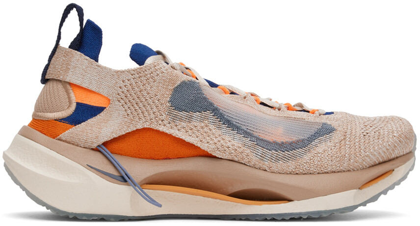 

Бежево-оранжевые кроссовки Spark Flyknit Nike