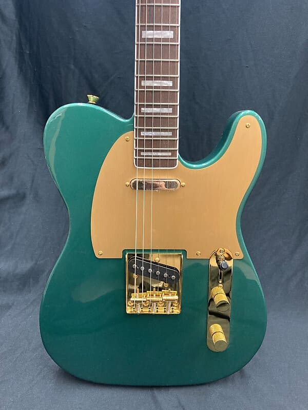 

Squier 40th Anniversary Telecaster - Золотое издание 40th Anniversary Telecaster - Gold Edition