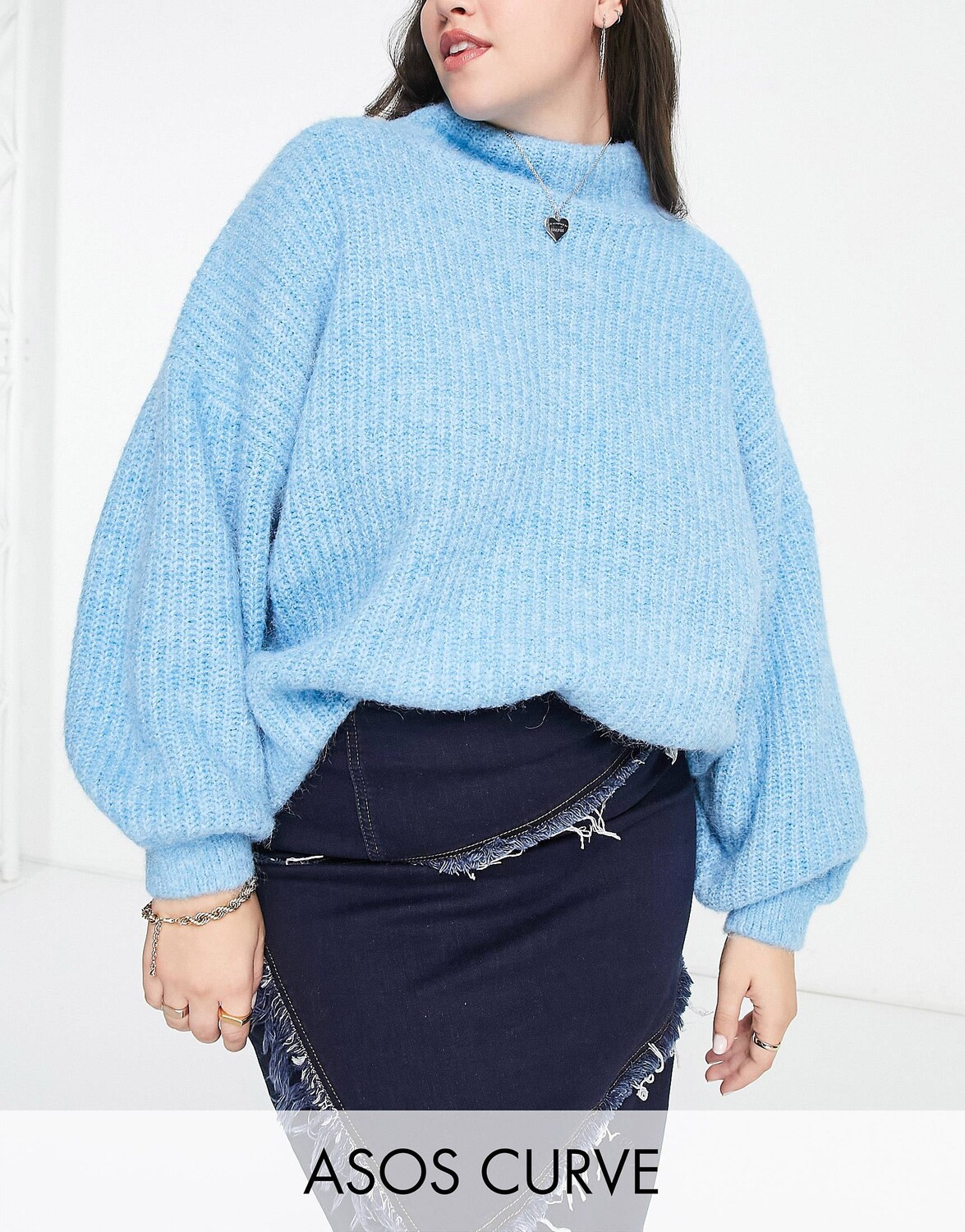 

Синий пушистый джемпер с высоким воротником ASOS DESIGN Curve