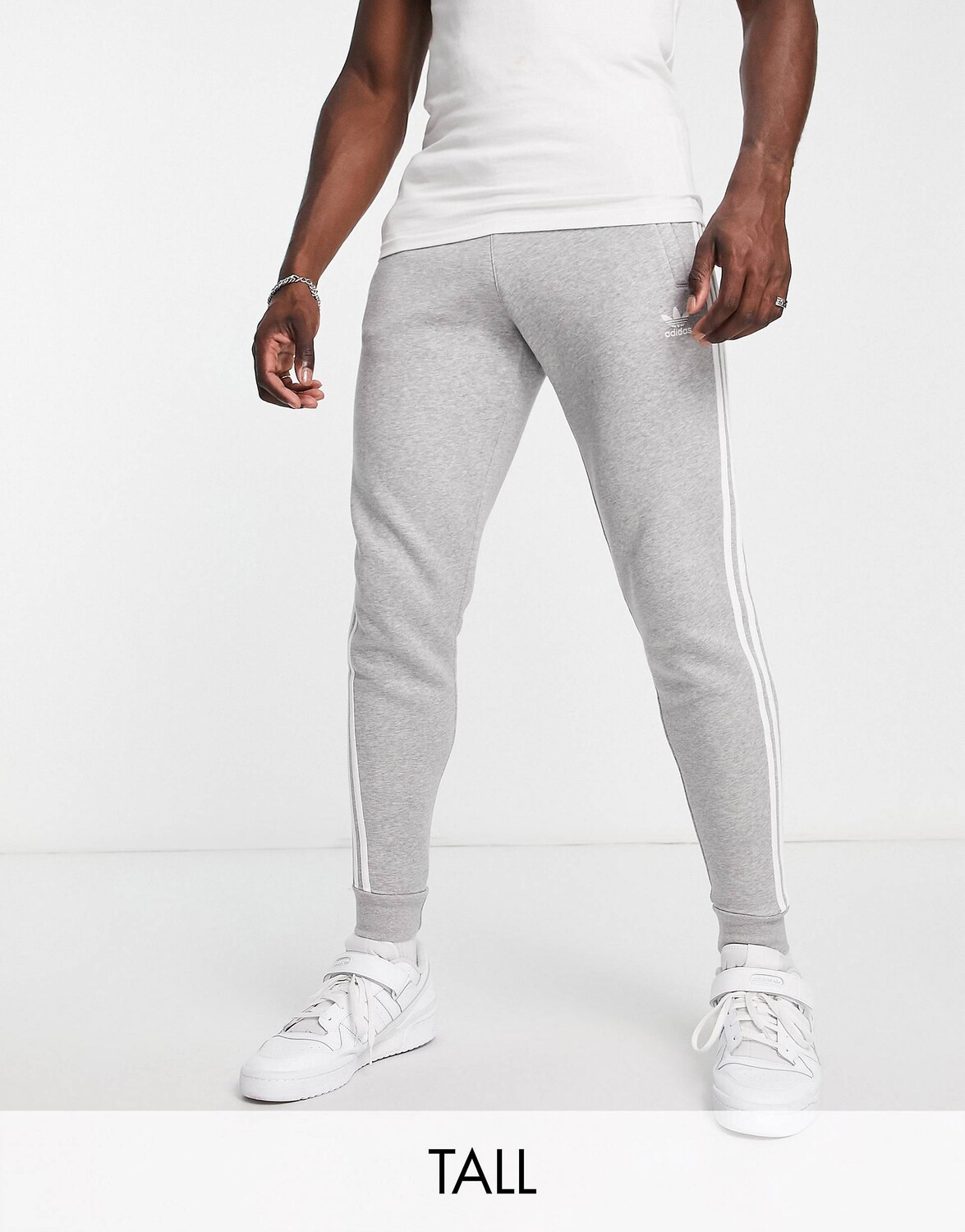 

Серые узкие джоггеры с 3 полосками adidas Originals Adicolor Tall