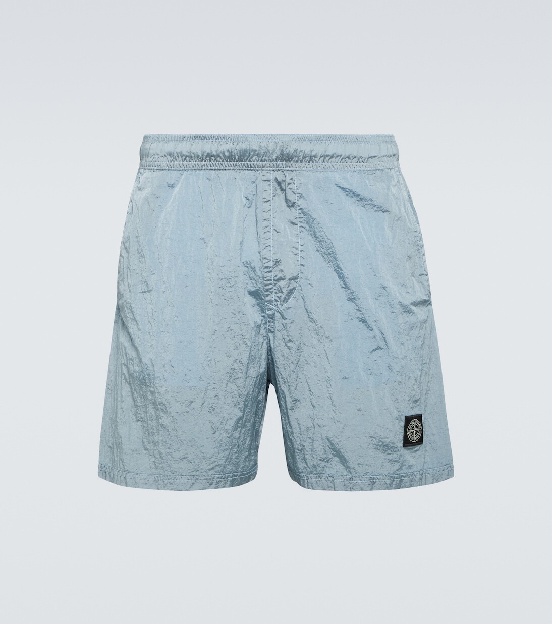 

Нейлоновые шорты с эффектом металлик Stone Island, синий