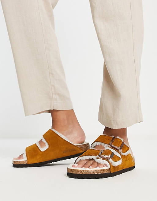 

Норковые сандалии на плоской подошве Birkenstock Arizona на меховой подкладке