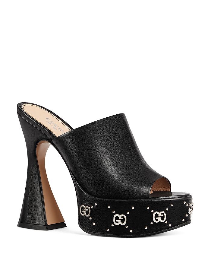 

Женские шлепанцы на платформе с заклепками Gucci