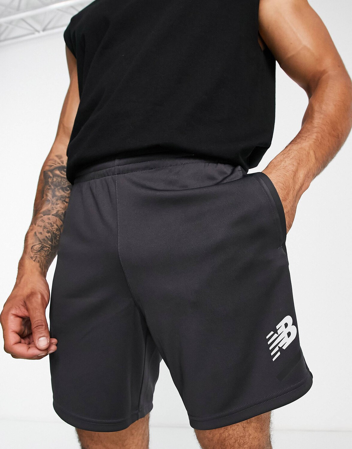

Черные футбольные шорты New Balance Tenacity Grit