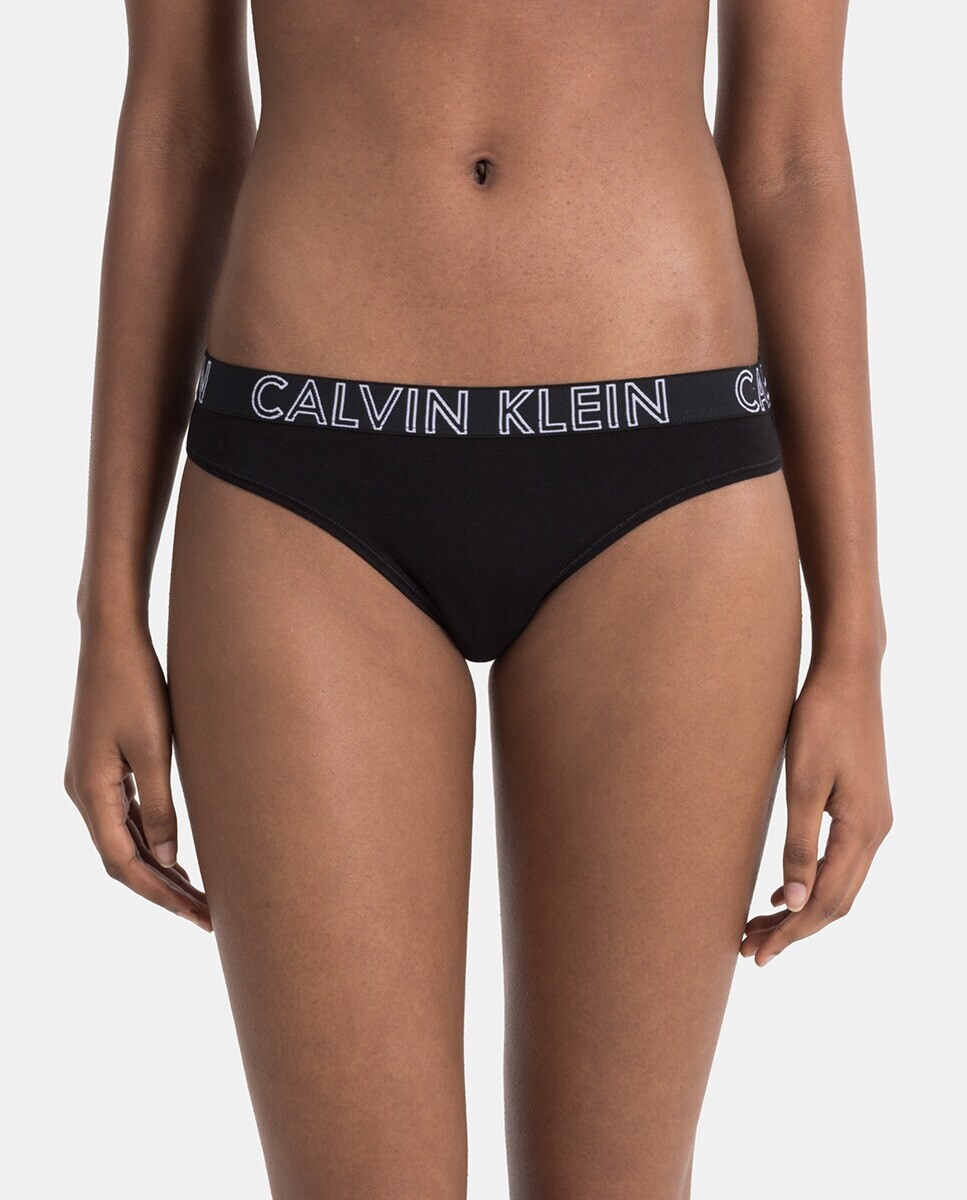 

Хлопковые стринги Ultimate Calvin Klein с контрастным логотипом Calvin Klein, черный