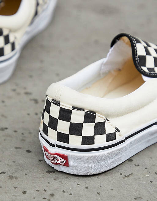 

Черные кроссовки в шахматную клетку Vans Slip-On