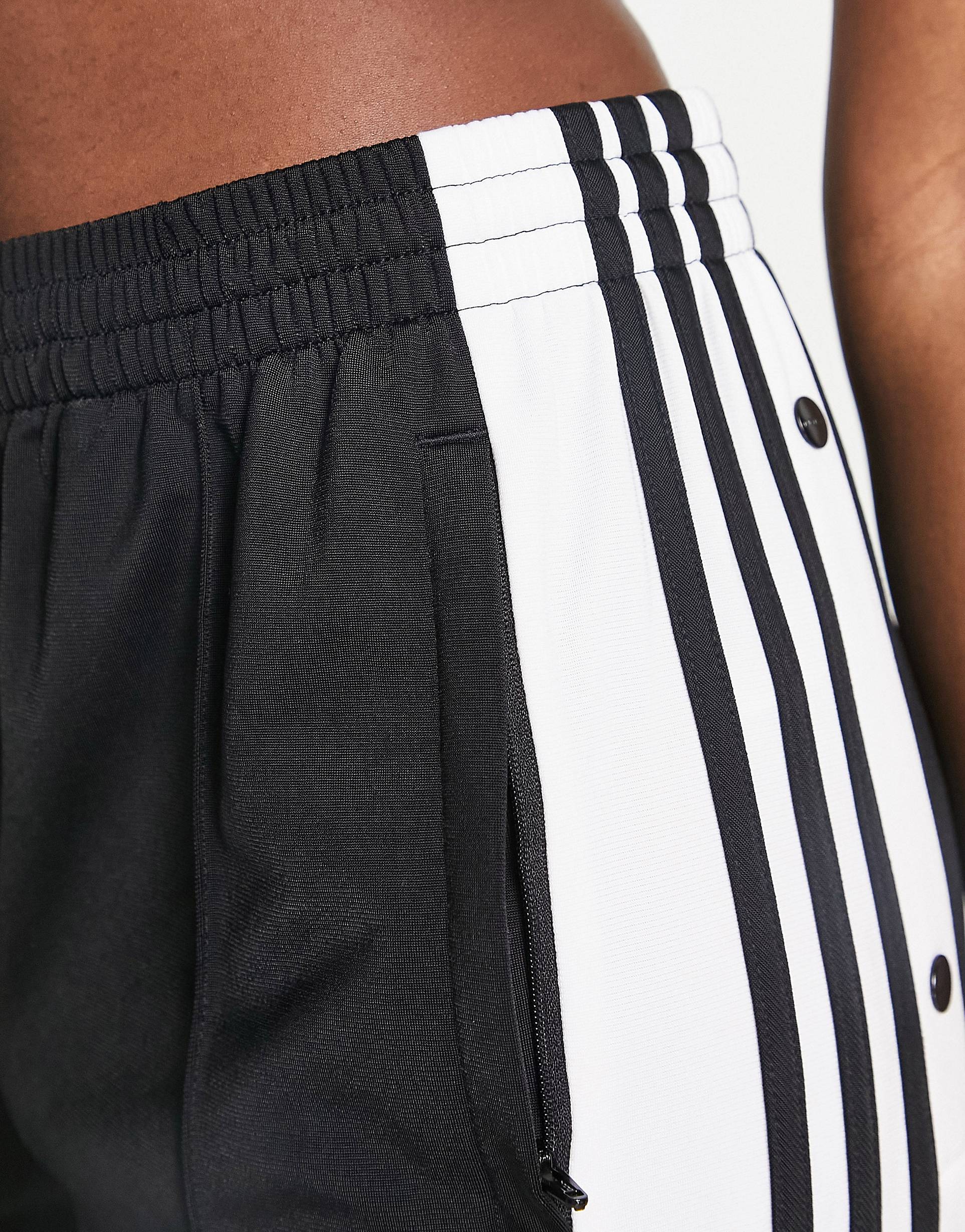 Черные спортивные брюки с кнопками по бокам adidas Originals adibreak –заказать по доступной цене из-за рубежа в «CDEK.Shopping»