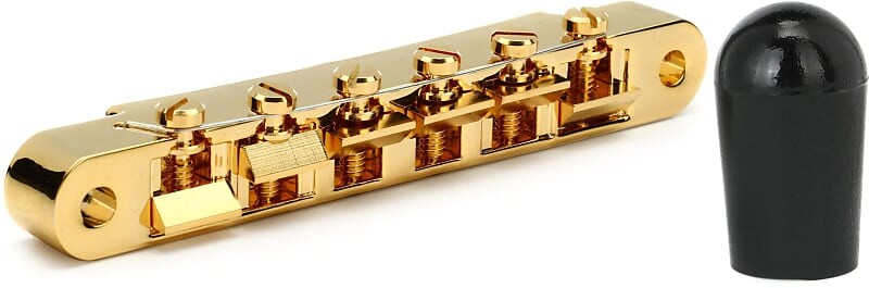 

Аксессуары Gibson ABR-1 Tune-O-Matic Bridge с полной сборкой - золотой комплект с колпачком тумблера аксессуаров Gibson - черный Gibson Accessories PBBR-020=1 PRTK-010=1