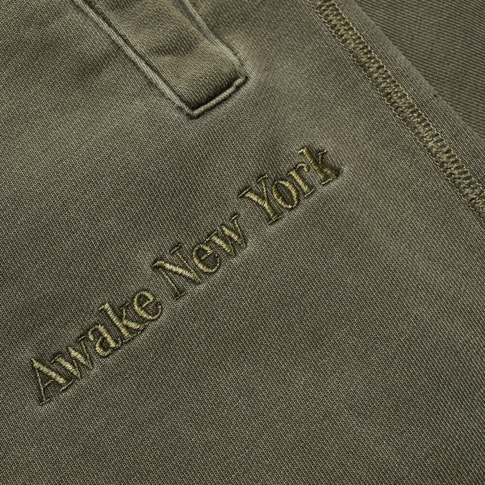 

Окрашенные пигментом спортивные брюки с вышивкой Awake NY