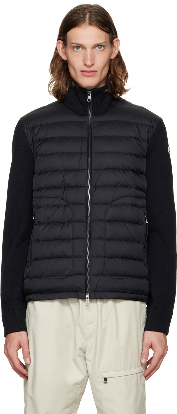 

Черный пуховик со вставками Moncler