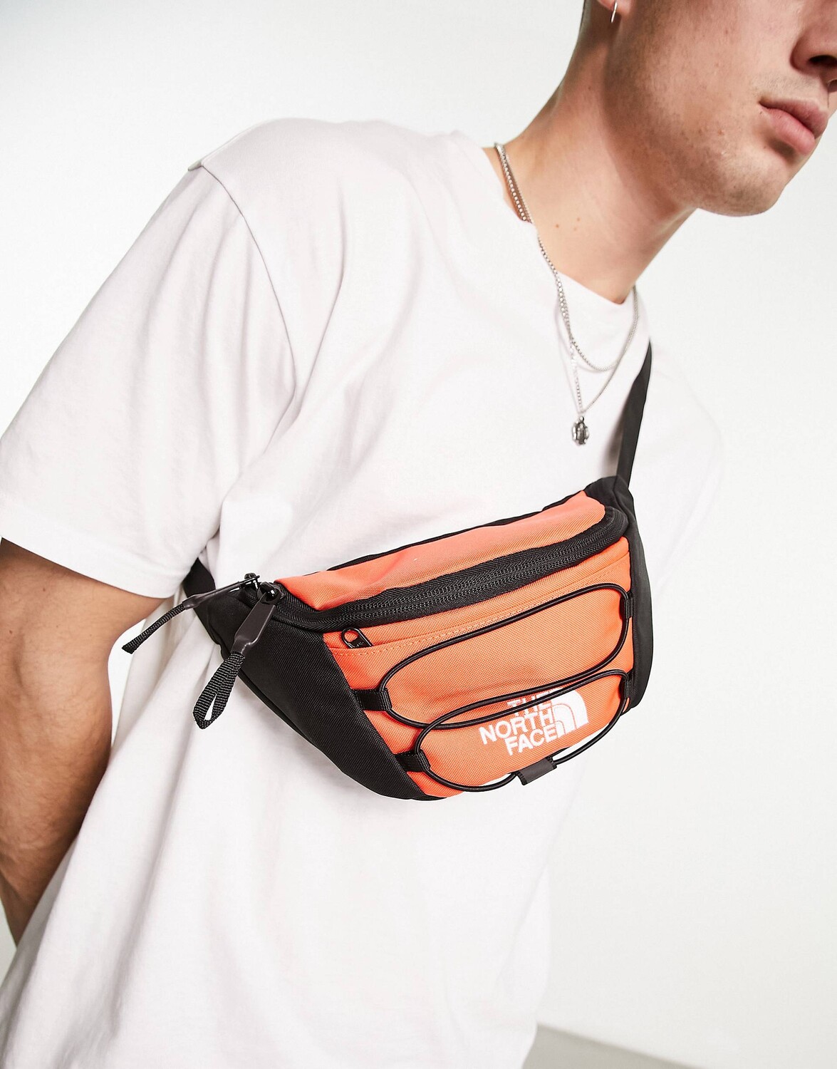 

Поясная сумка The North Face Jester оранжево-черного цвета