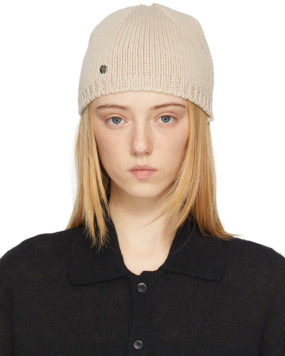 

Бежевая вязаная шапка TheOpen Product