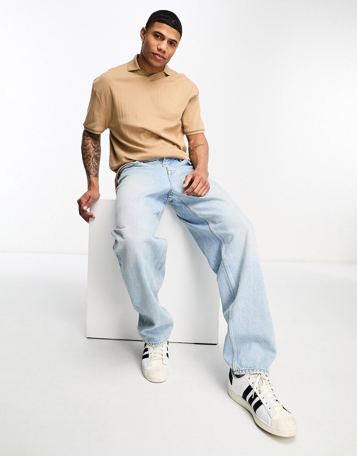 

Светло-коричневое поло свободного кроя в рубчик ASOS DESIGN
